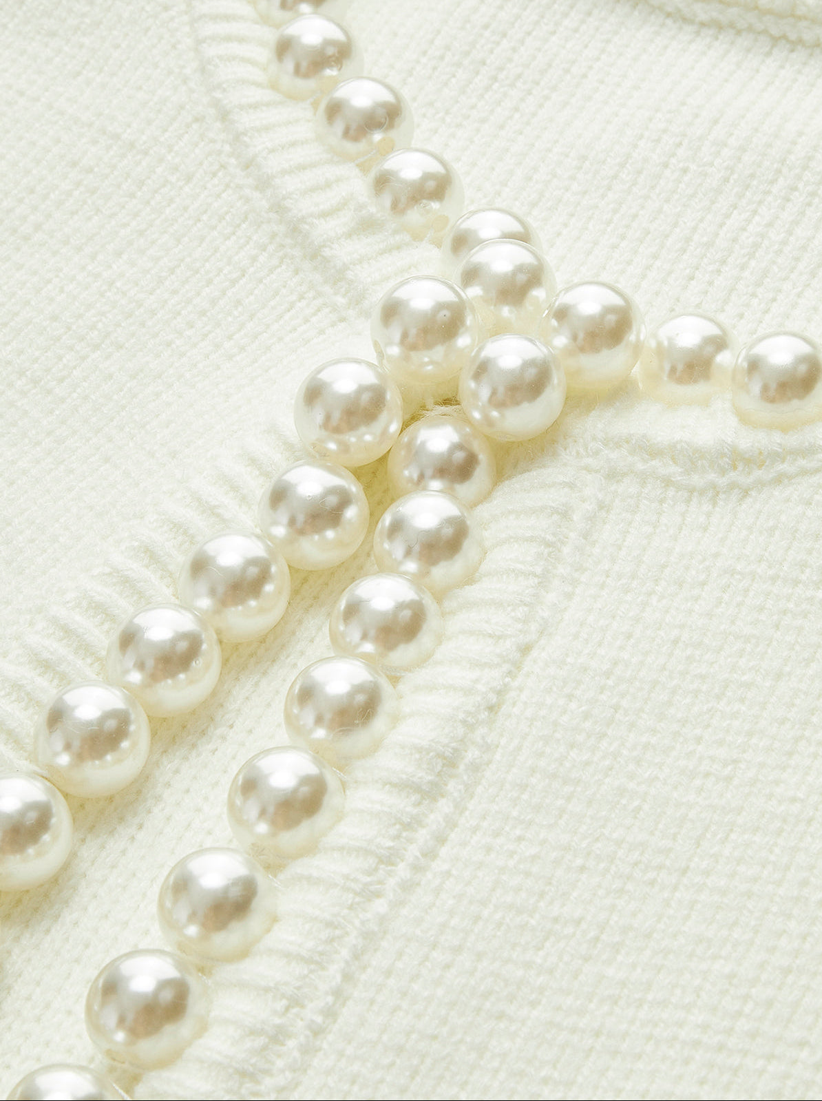 Pearl Button Knit Cardigan with Distressed Hem